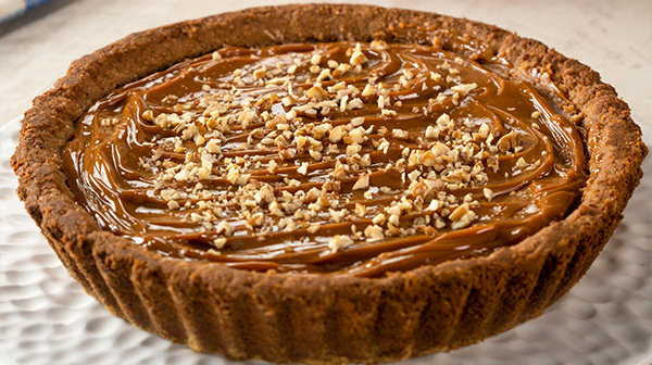 Pay de queso con dulce de leche